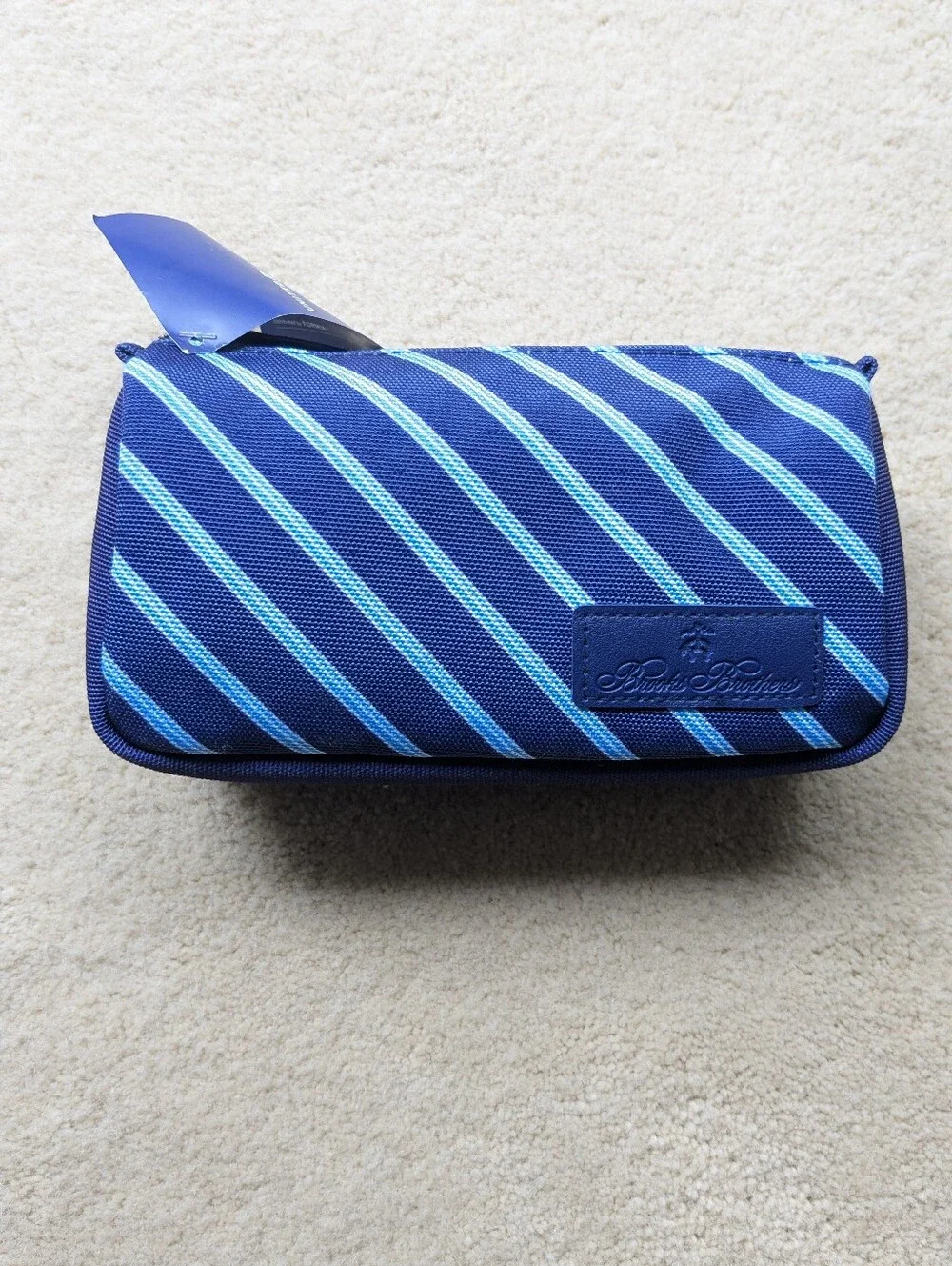 United x Brooks Brothers & Perricone MD products Amenity Bag